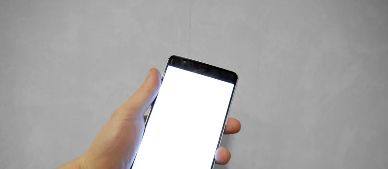 Smartphone with blank display – asking a customer for a Google review