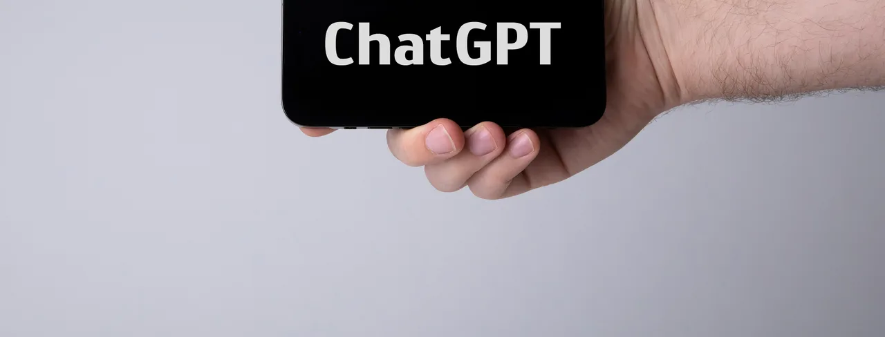 Smartphone showing ChatGPT – testing your own business's AI visibility